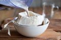 Preparation of poppy seed milk - straining the milk through a milk bag