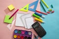 Preparation of primary school children. Bright and multicolored school background with stationery accessories for the study of