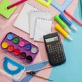 Preparation of primary school children. Bright and multicolored school background with stationery accessories for the study of