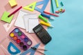 Preparation of primary school children. Bright and multicolored school background with stationery accessories for the study of