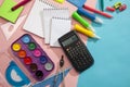 Preparation of primary school children. Bright and multicolored school background with stationery accessories for the study of