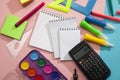 Preparation of primary school children. Bright and multicolored school background with stationery accessories for the study of