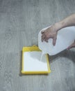 Preparation for priming the plastered surface for further painting Royalty Free Stock Photo