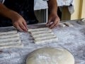 Preparation of raw materials for making deep-fried dough sticks or Patongko with wheat flour before throw in boiling oil to fry.