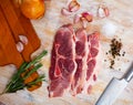 Preparation of raw pork shoulder on wooden board Royalty Free Stock Photo