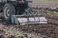 Preparation soil for ready to sowing crops with tractor.