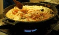 Preparation of spanish traditional dish - Paella