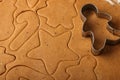 Preparation of a traditional gingerbread. Christmas. New year. The dough and cutting the cookie on the table Royalty Free Stock Photo