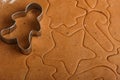 Preparation of a traditional gingerbread. Christmas. New year. The dough and cutting the cookie on the table Royalty Free Stock Photo