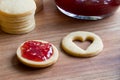 Preparation of Linzer Christmas cookies - filling with jam