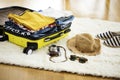 Preparation travel suitcase at home Royalty Free Stock Photo