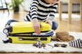 Preparation travel suitcase at home Royalty Free Stock Photo