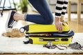 Preparation travel suitcase at home Royalty Free Stock Photo