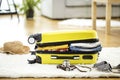 Preparation travel suitcase at home Royalty Free Stock Photo