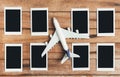 Preparation for Traveling concept, Airplane with photo frame. Royalty Free Stock Photo