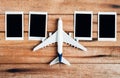 Preparation for Traveling concept , Airplane with photo frame. Royalty Free Stock Photo