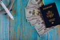 Preparation traveling of airplane on U.S. dollar bills for travel with USA passport