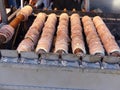 Preparation of the Trdelnik, traditional cake of Prague, Czech Republic. Royalty Free Stock Photo