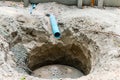 Preparation of zeptic tank ditch of a small house by digging into the ground behind the restroom. Royalty Free Stock Photo