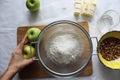 Preparations for Apple pie: flour, apples, butter, nuts. Homemade cake Royalty Free Stock Photo