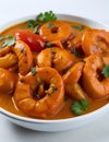 Fiery Temptation: Close-Up of Spicy Shrimp Curry on a White Background. AI Generated