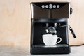 prepare a cup of coffee in espresso machine Royalty Free Stock Photo