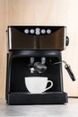 prepare a cup of coffee in espresso machine Royalty Free Stock Photo
