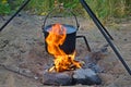 Prepare food and tea in a pot on the fire. Royalty Free Stock Photo