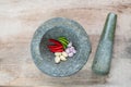 Prepare ingredient inside the stone mortar Royalty Free Stock Photo