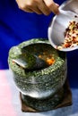 Prepare Ingredient Inside The Stone Mortar, ingredients and Paste with mortar Thaifood Royalty Free Stock Photo