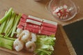 We prepare ingredients for sushi at home. Do it yourself, Nori, crab sticks, cucumbers, shrimp, fish. Mat