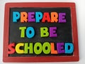 Prepare to be schooled written on a chalkboard Royalty Free Stock Photo