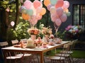 Prepared birthday table in summer green garden Royalty Free Stock Photo