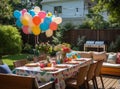 Prepared birthday table in summer green garden Royalty Free Stock Photo