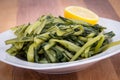 Prepared boiled dandelion greens bowl