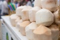 Prepared Coconuts Stacked on Beverage Cart