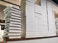 Prepared for delivery cardboard white pizza boxes stacked on a pizza counter Royalty Free Stock Photo