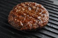 Prepared meat cutlet for burger on grill