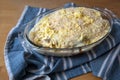 Prepared Moussaka ready to bake in the oven, a traditional Greek casserole of eggplants, potatoes, minced meat and sauce in a
