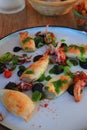 Prepared plate of cuttlefish and squid on the table of a restaurant Royalty Free Stock Photo