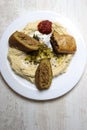 Prepared plate of kibbeh, bourek and hummus Royalty Free Stock Photo