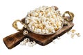 Prepared salty popcorn in a skillet and corn kernel. Isolated, white background. Royalty Free Stock Photo
