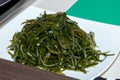 Prepared sea cabbage salad and served on a plate Royalty Free Stock Photo