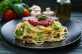 Prepared spaghetti pasta with tomato sauce, roasted champignons