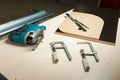 Prepared tool jigsaw with wood clamps and a pencil with a ruler lying