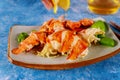 Prepared yummy meat lobster on plate of lemon Royalty Free Stock Photo
