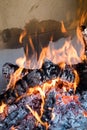 Burning wood to obtain carbon