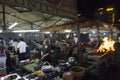 Preparing barbecue in Saigon street restaurant