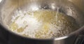 Preparing bechamel sauce adding flour