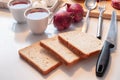 Preparing Bread with tea cup and kitchenware, egetable and meat on table Royalty Free Stock Photo